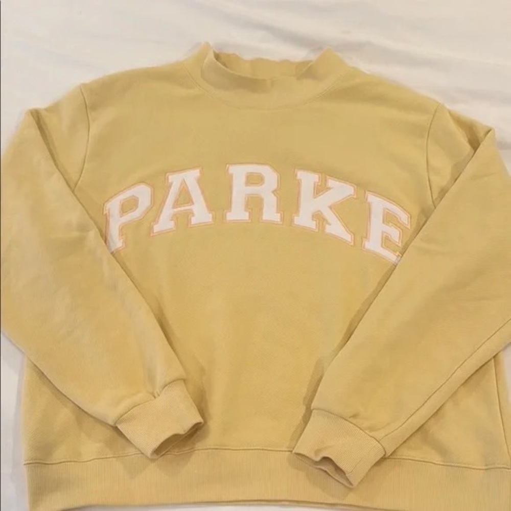 Parke mock neck still with original tags and brand new light yellow